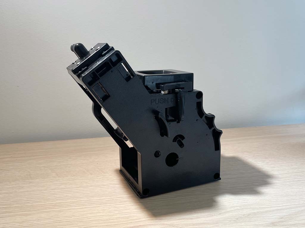 Voorbeeld zetgroep van een koffiemachine.