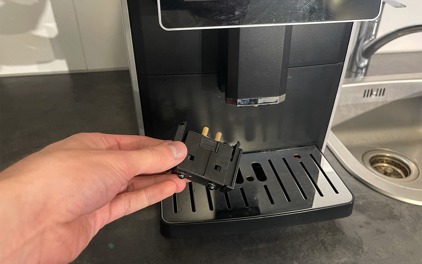 Uitloop koffiemachine verstopping verhelpen